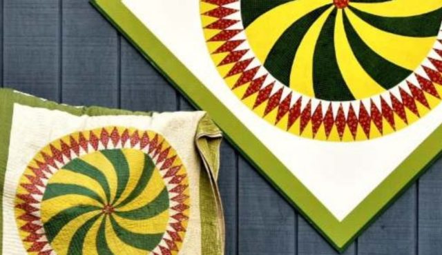 photo of quilter next to UHQT quilt block
