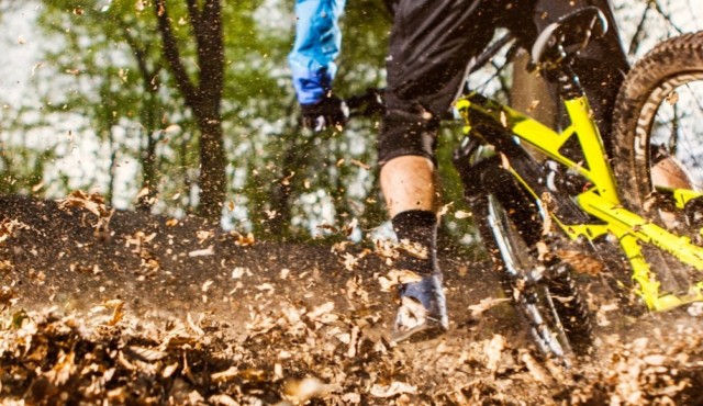 photo of mountain bike spewing mud