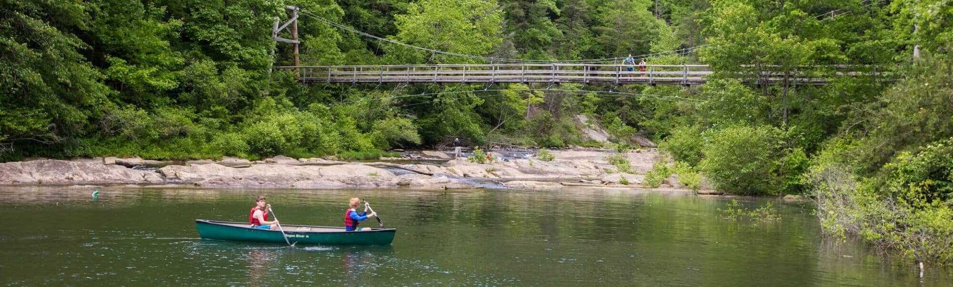 photo of kids canoeing