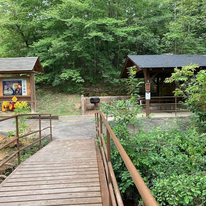 photo of walking bridge and picnic shelter at Chau Ram park