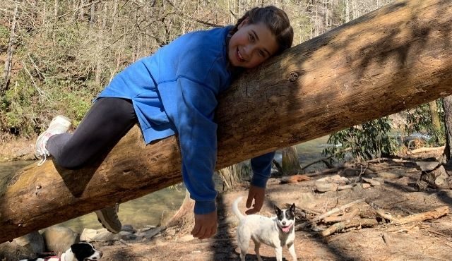 girl resting on tree in Mtn rest, sc