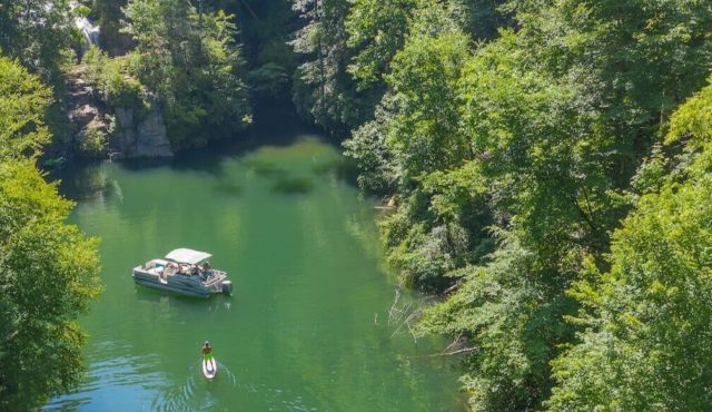 aerial view pontoon boat, SUP on Lake Jocassee