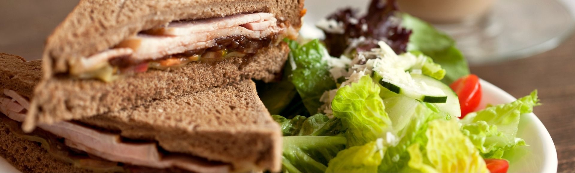 photo of sandwich and salad