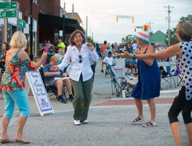 photo of ladies dancing at Jazz on the Alley