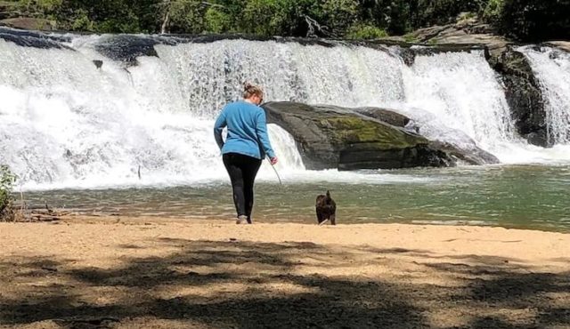 Woman and dog at Riley Moore Falls