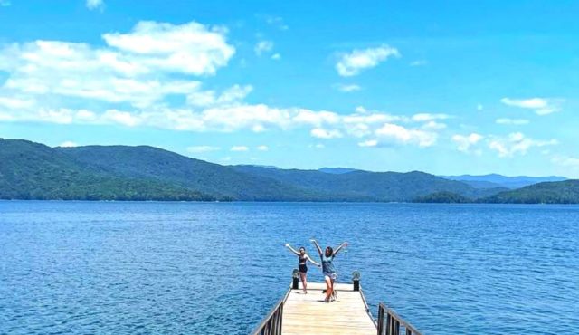 photo of girls on dock at Lake Keowee