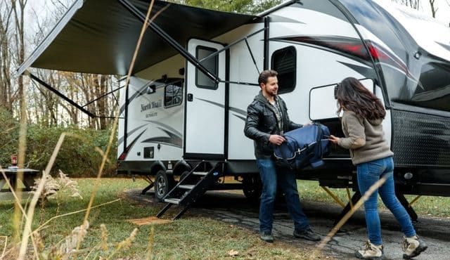 image of couple unloading an RV