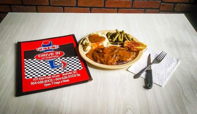 photo of menu and plate of food