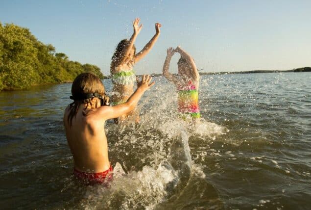 photo of kids swimming